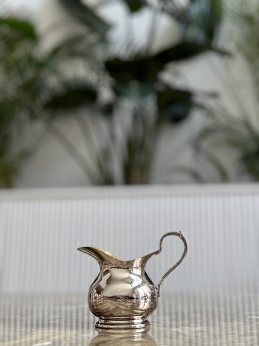 Antique silver-plated milk jug