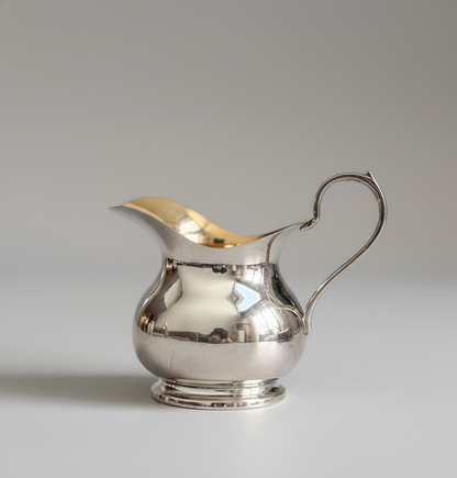 Antique silver-plated milk jug